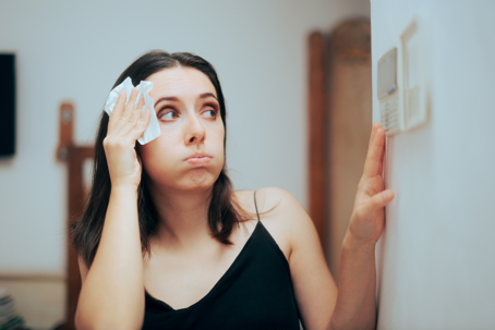 woman feeling the heat during summer